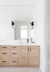 A minimalist bathroom vanity with mirror